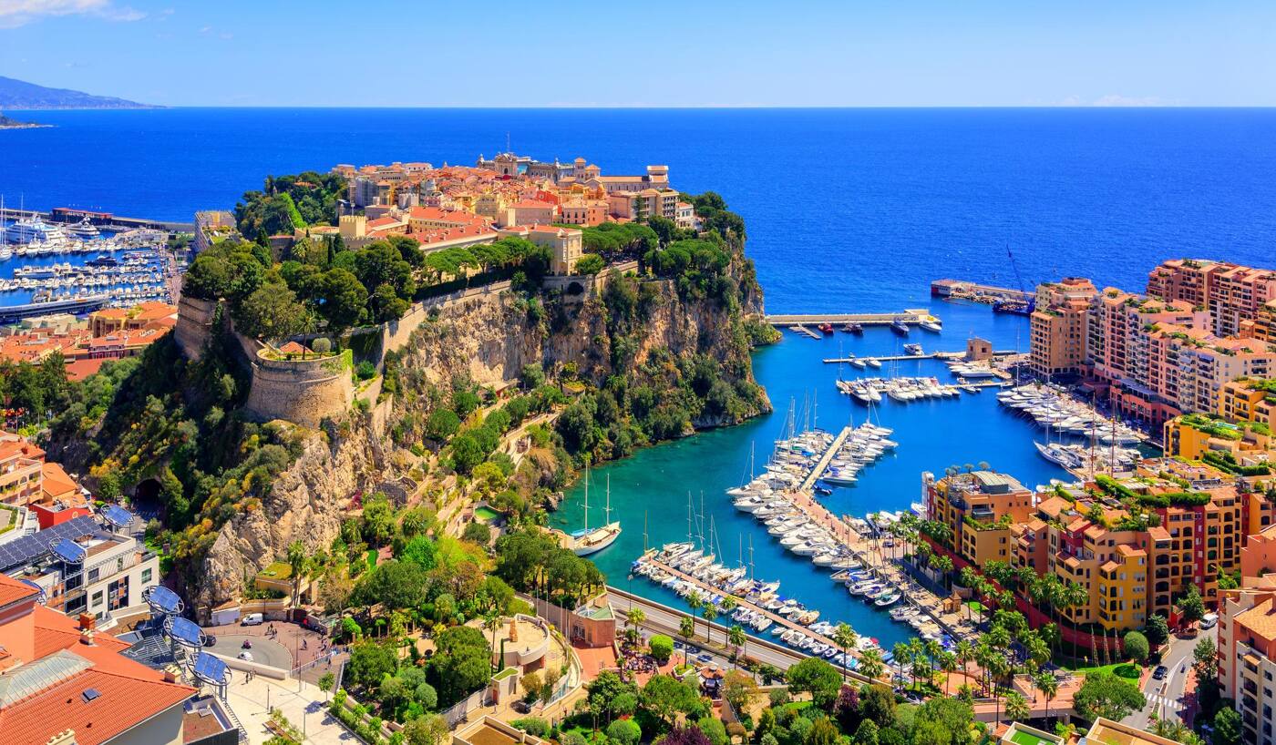 Aerial view of Monaco, the old town rising above the harbour